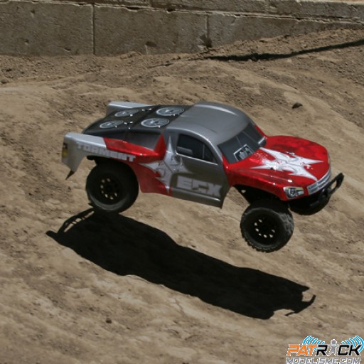 ECX Torment short Course truck rouge/gris 2.4GHz RTR 1/10e