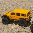 Axial SCX24 2019 Jeep Wrangler Jaune JLU CRC 4WD 1/24e Prête à rouler